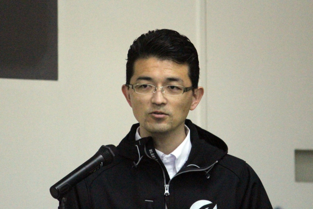 事業説明会で登壇した、ブランド体験推進本部でモータースポーツ体験を担当する後藤憲吾氏。